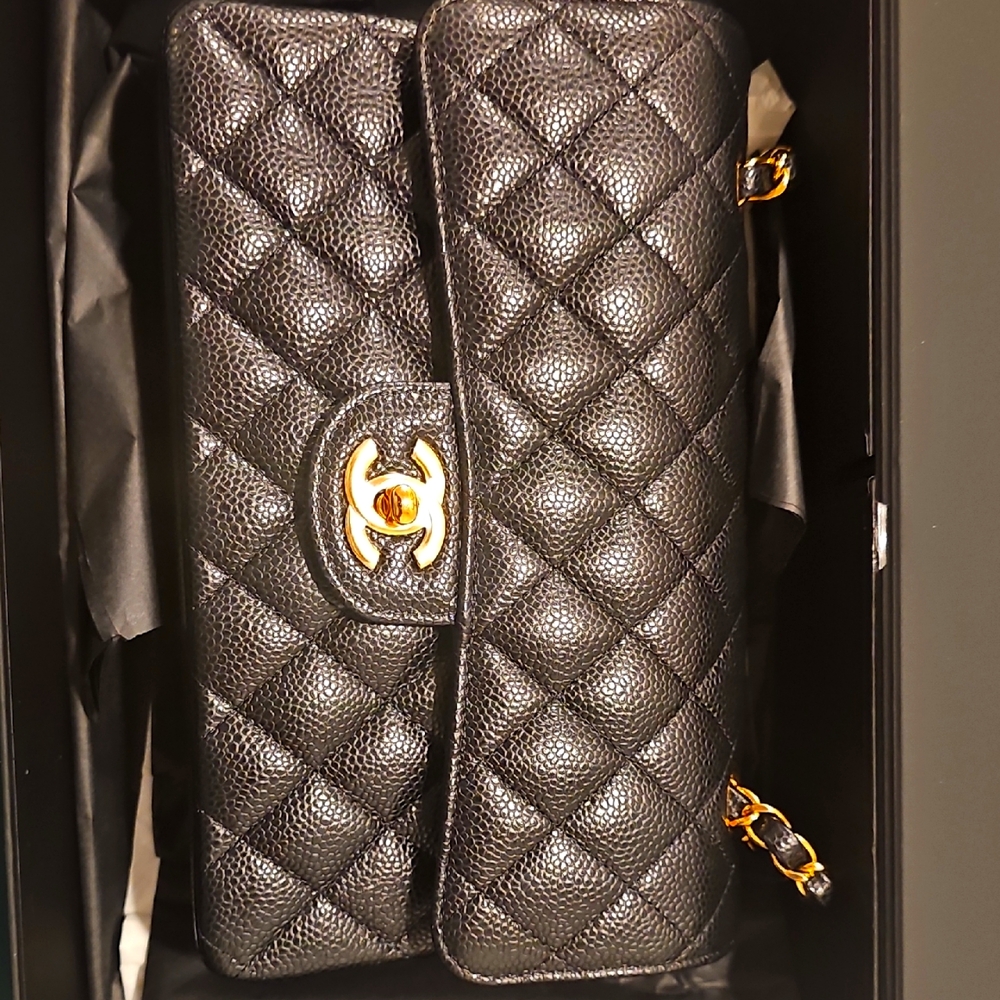 Elegant Black Quilted Clutch with Gold Accents